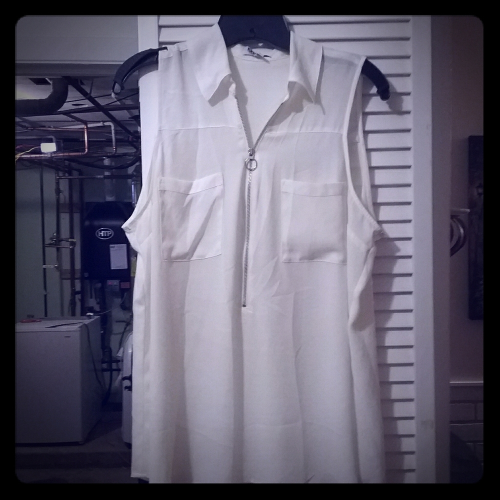 Sleeveless blouse with half zip front